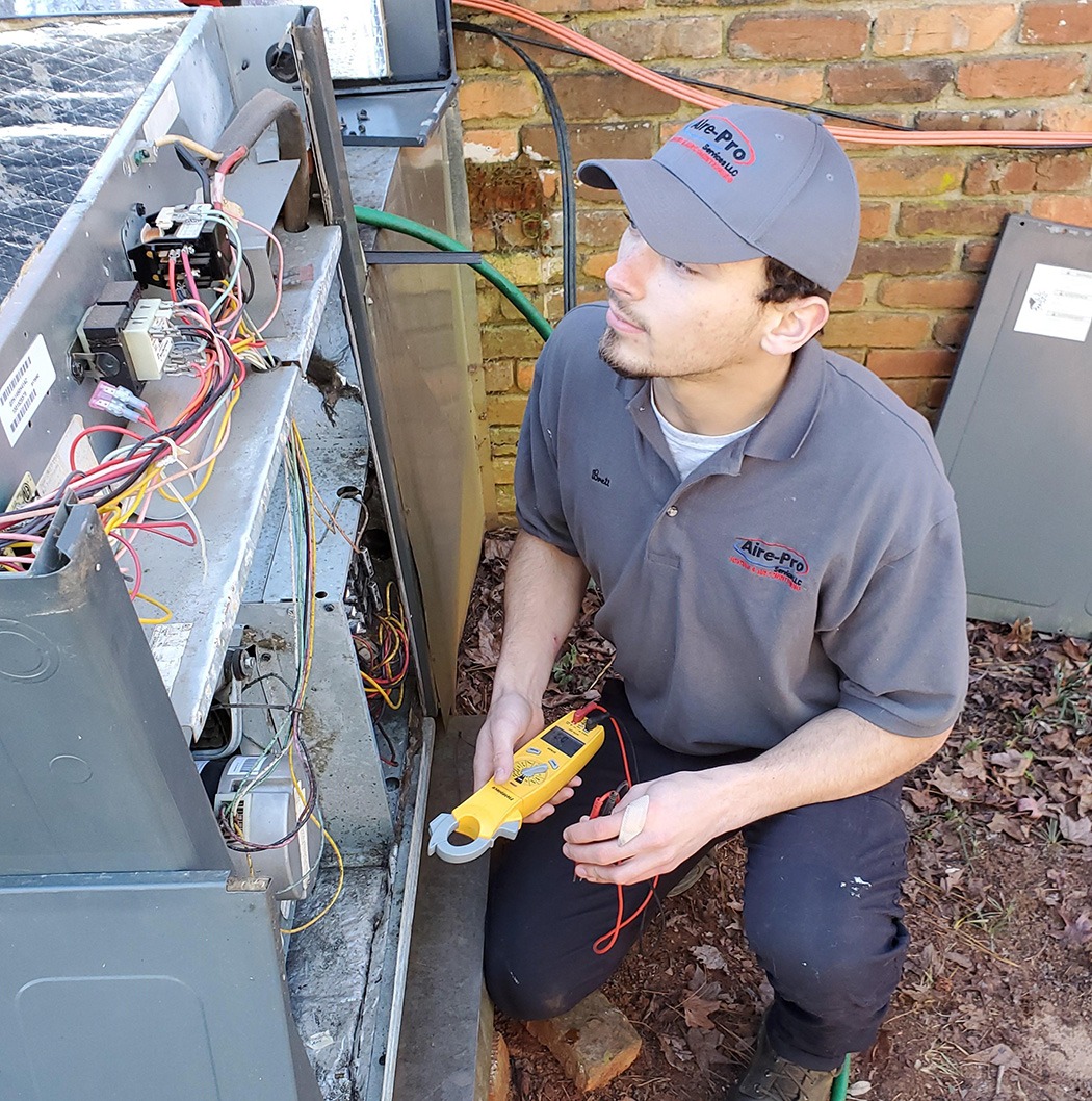 residential ac repair hvac repair man repairing ac