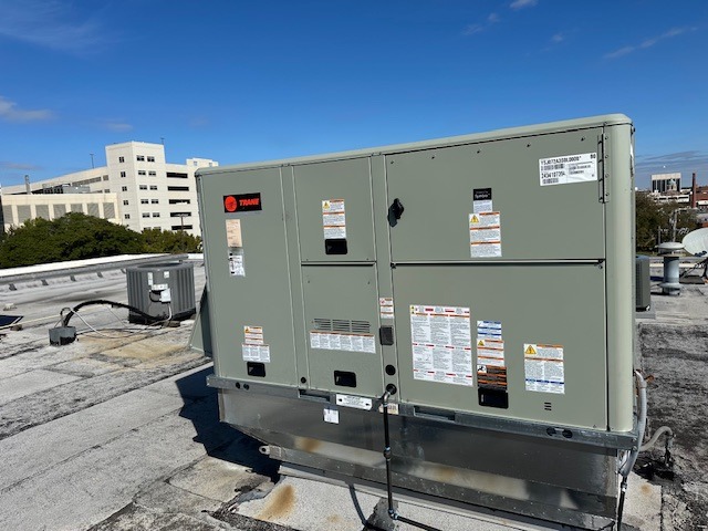 commercial rooftop hvac ac repair hvac repair man repairing ac